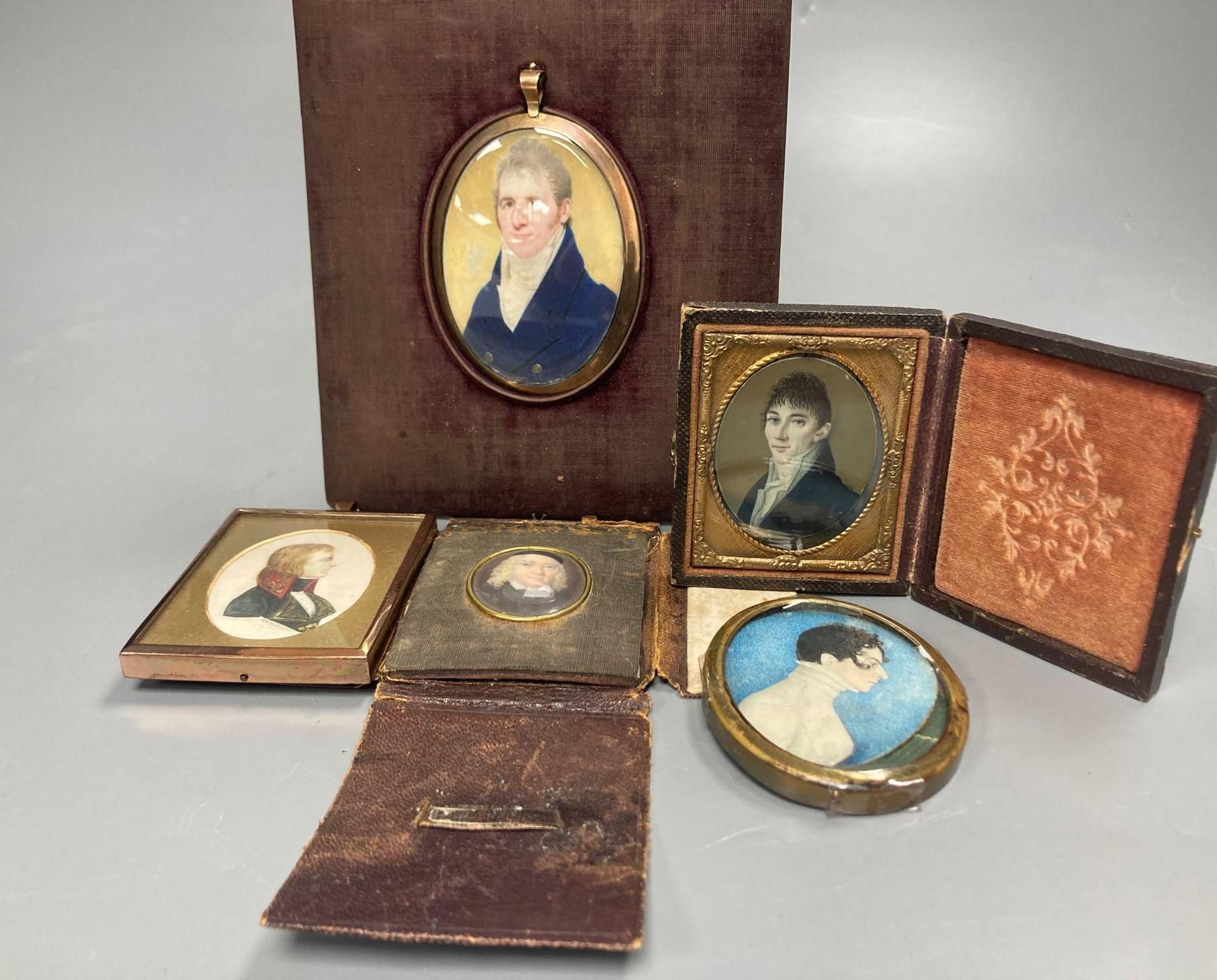 Five assorted miniatures of gentleman including one in yellow metal frame, largest being an oval portrait in a brown velvet frame, 5cm